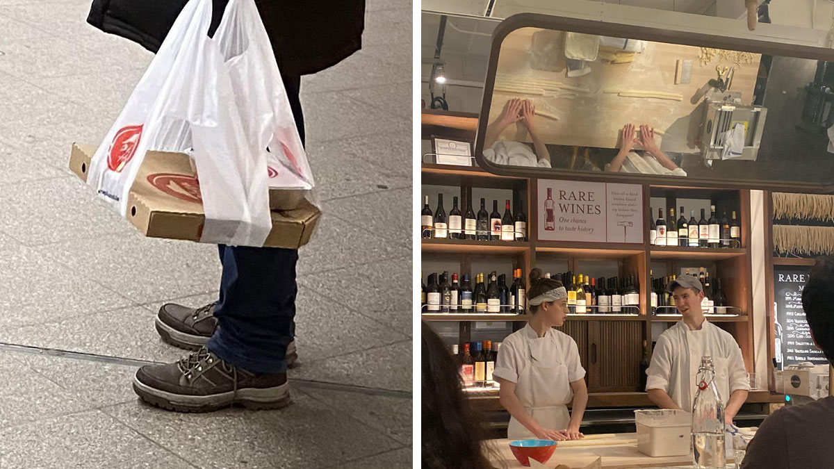 Man carrying pizza boxes with plastic bags to make holding easier and two chefs working in a restaurant with wine bottles behind.